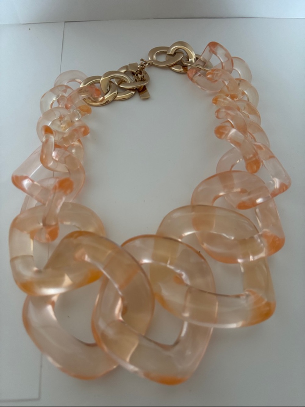 Large peach / gold lucite necklace Anthropologie